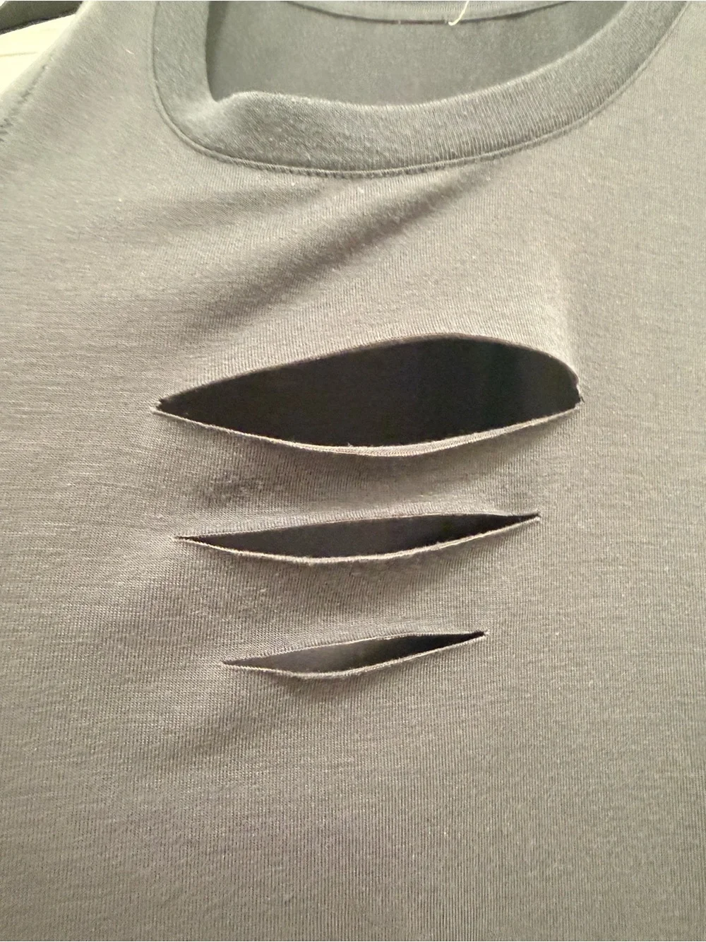 ALO top with side cutouts